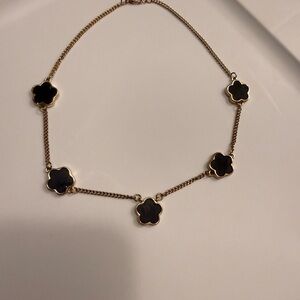 Elegant Black and Gold Clover Necklace